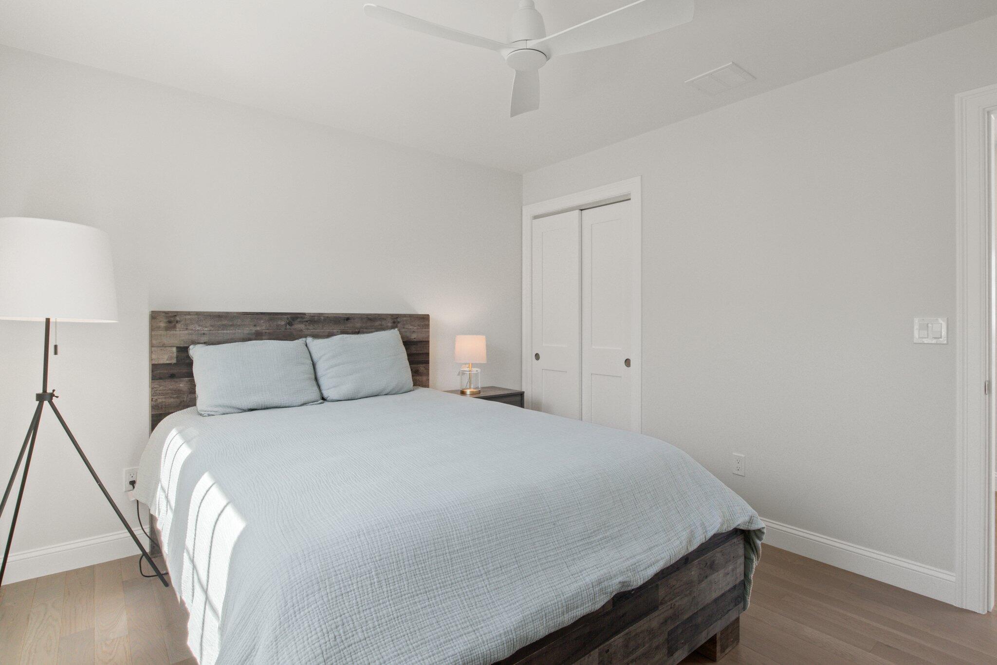 85 Cobblestone Circle Mashpee, MA 02649 - Photo 28 of 42 a bedroom with a bed and wooden floor