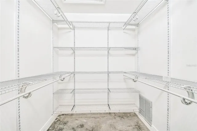 a bathroom with a sink a vanity and a mirror