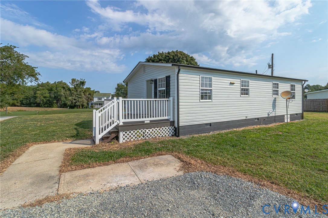 36 Bundick Road Lottsburg, VA 22511 - Photo 39 of 50 White siding exterior with a front porch, white ra