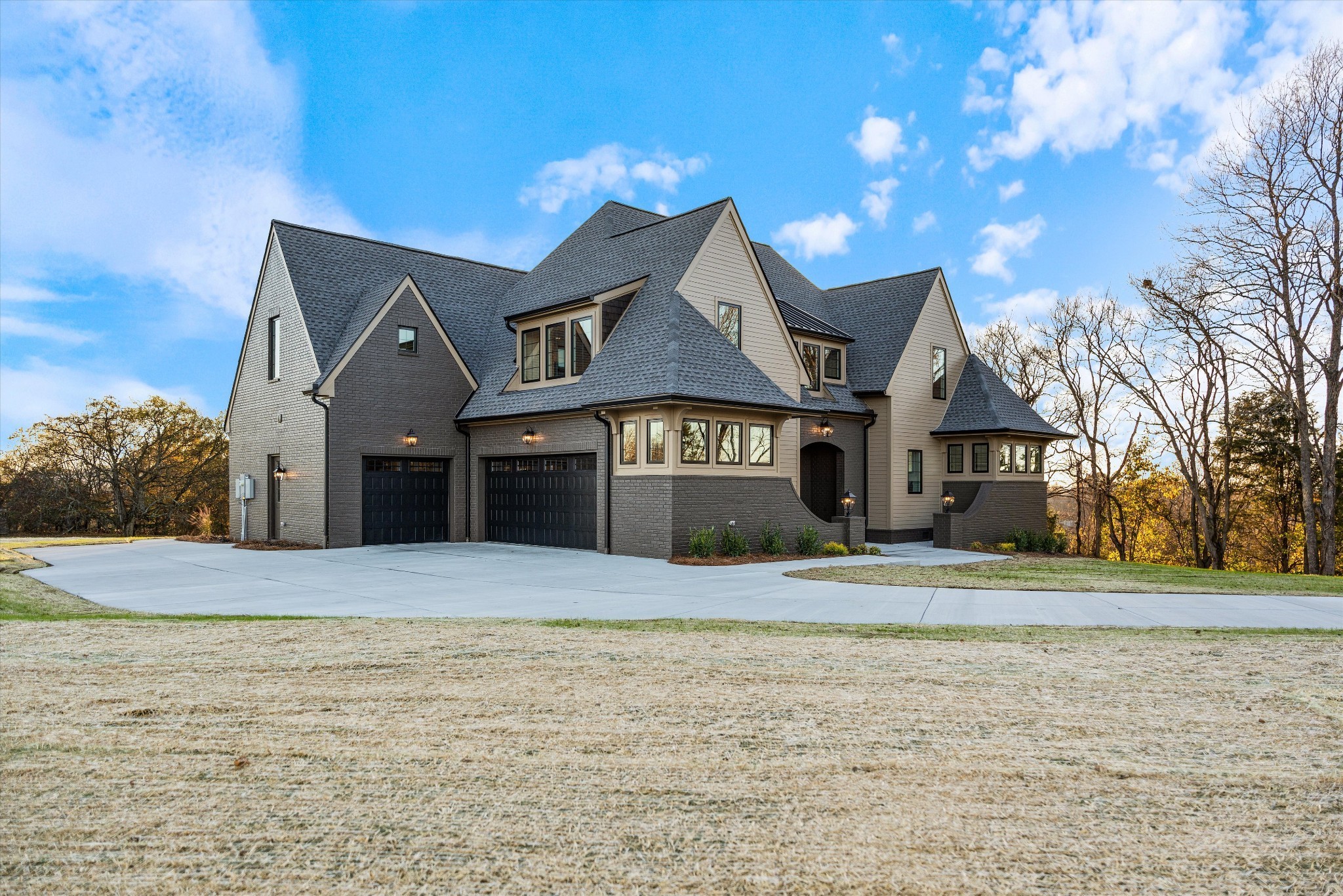 a front view of a house with a yard