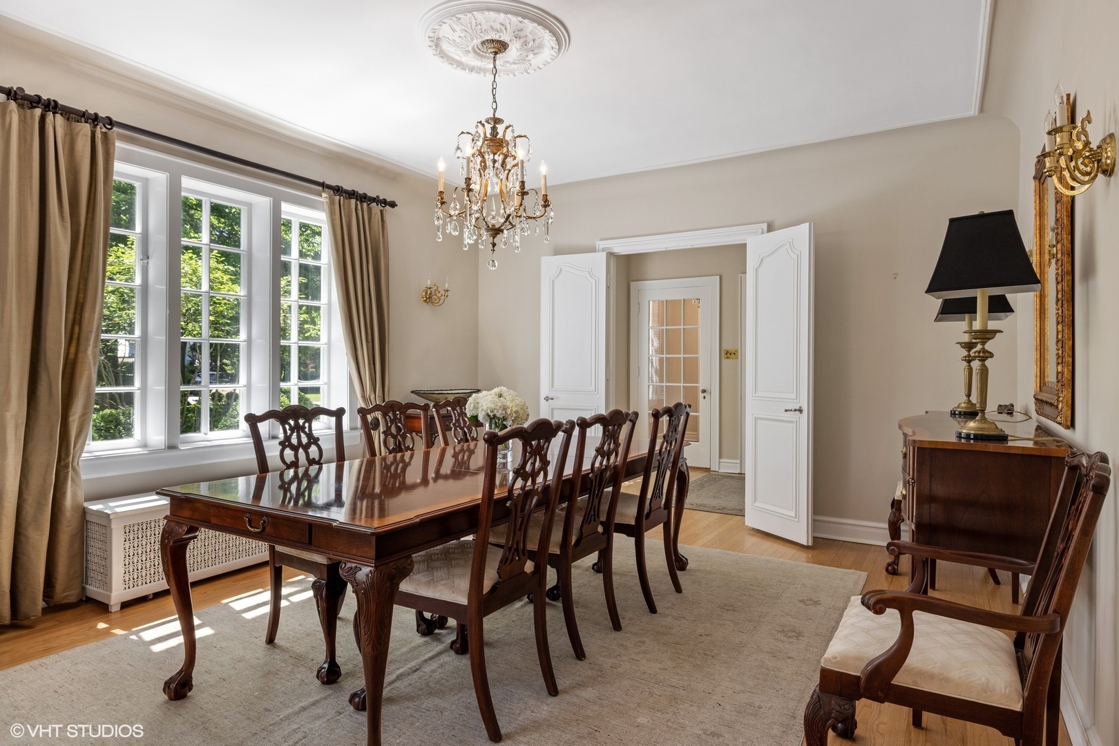 474 Ash Street Winnetka, IL 60093 - Photo 11 of 57 a view of a dining room with furniture window and wooden floor