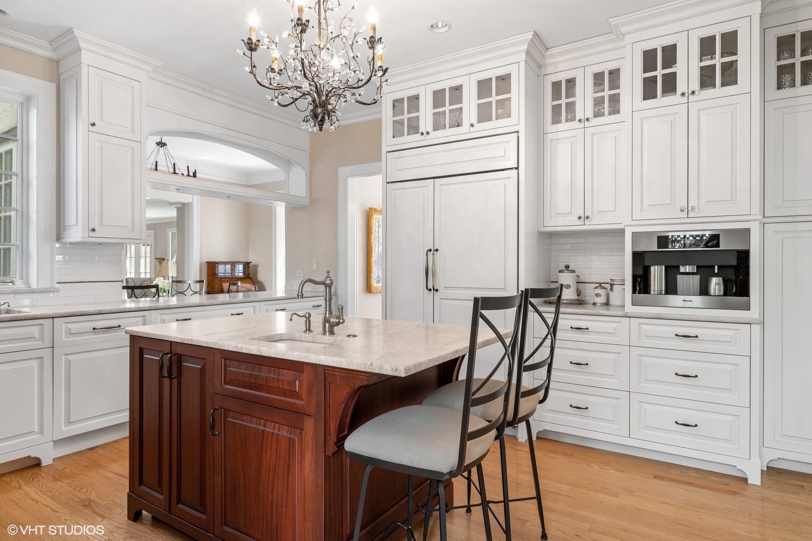 474 Ash Street Winnetka, IL 60093 - Photo 14 of 57 a kitchen with stainless steel appliances granite countertop a table and chairs in it