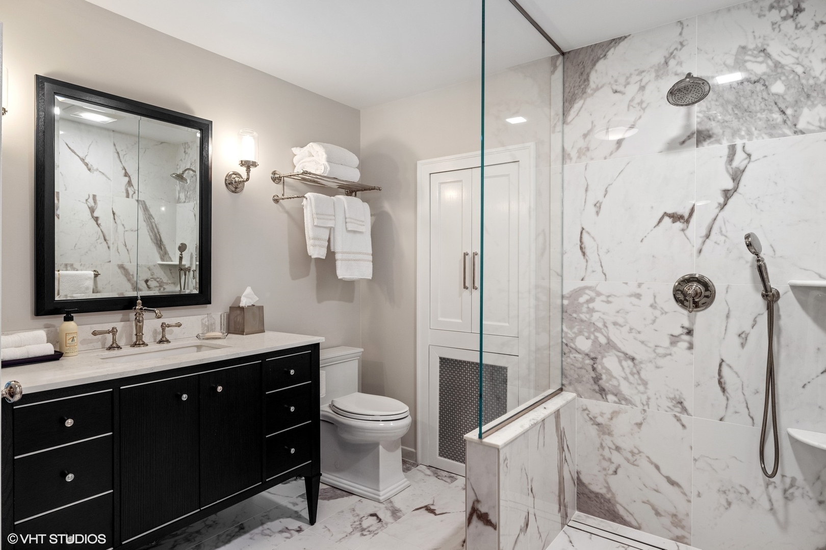 474 Ash Street Winnetka, IL 60093 - Photo 37 of 57 a bathroom with a double vanity sink toilet and shower