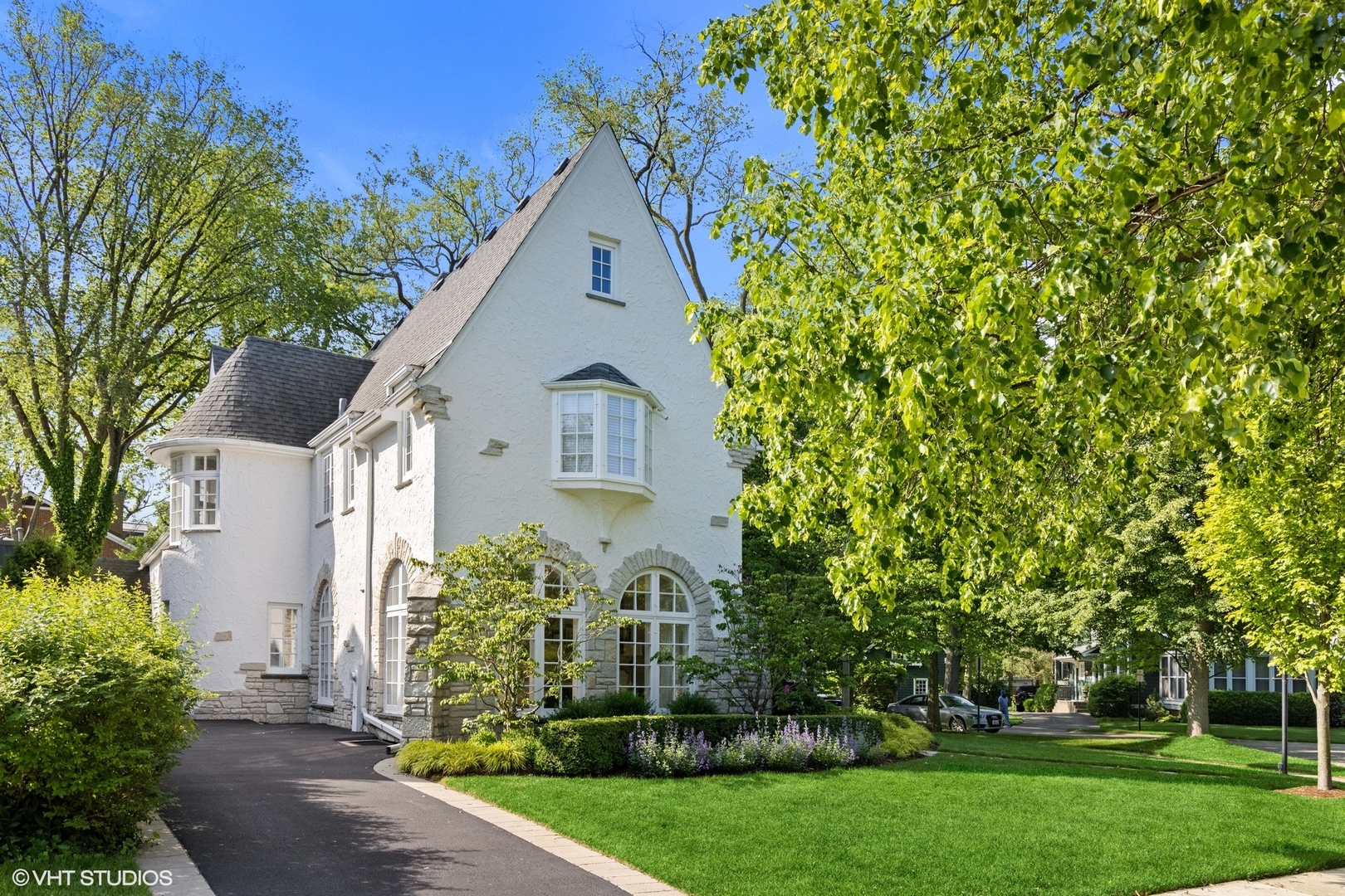 474 Ash Street Winnetka, IL 60093 - Photo 51 of 57 a view of a house with a yard and garden