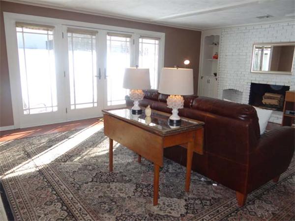 7 Burton Farm Drive Andover, MA 01810 - Photo 11 of 20 a living room with furniture and a window