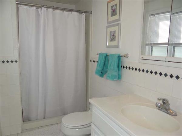 7 Burton Farm Drive Andover, MA 01810 - Photo 19 of 20 a bathroom with a sink and a bathtub