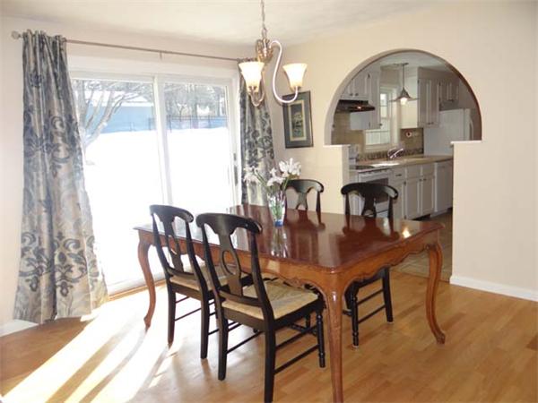7 Burton Farm Drive Andover, MA 01810 - Photo 5 of 20 a view of a dining room with furniture and window