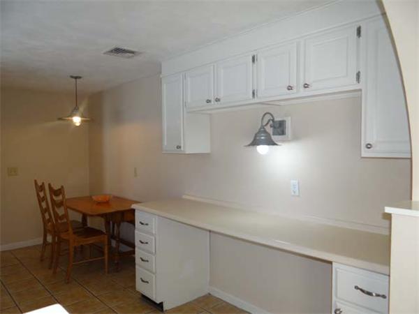 7 Burton Farm Drive Andover, MA 01810 - Photo 10 of 20 a view of a kitchen with white cabinets