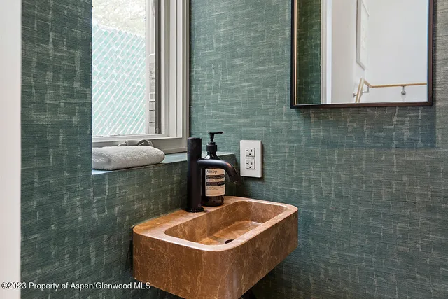 a bath tub sitting in a bathroom
