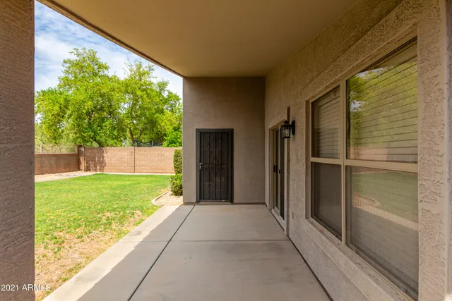 a house view with a backyard space