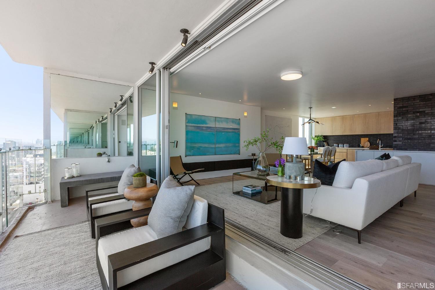1835 Franklin Street, Unit 1601 San Francisco, CA 94109 - Photo 16 of 37 a living room with furniture and a large window