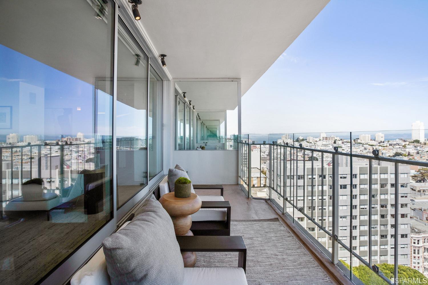 1835 Franklin Street, Unit 1601 San Francisco, CA 94109 - Photo 17 of 37 a balcony with furniture and city view