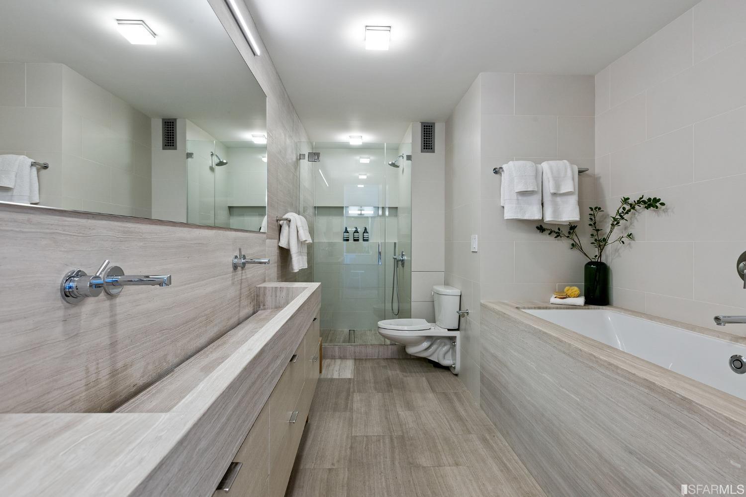 1835 Franklin Street, Unit 1601 San Francisco, CA 94109 - Photo 26 of 37 a spacious bathroom with a tub sink and toilet