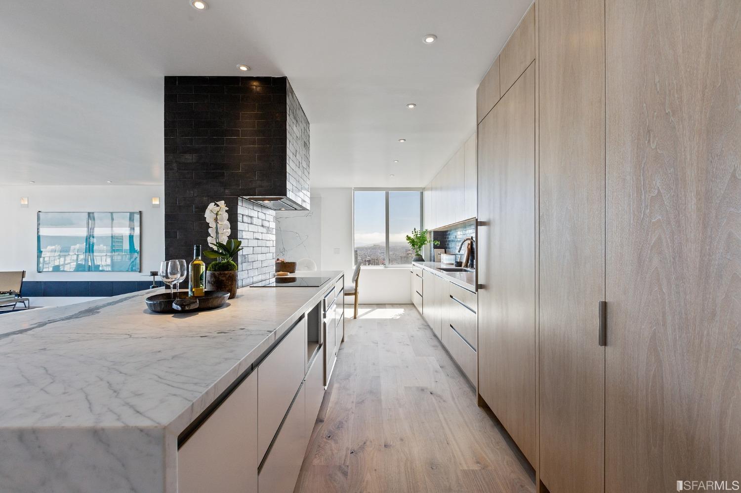 1835 Franklin Street, Unit 1601 San Francisco, CA 94109 - Photo 5 of 37 a kitchen with sink and refrigerator