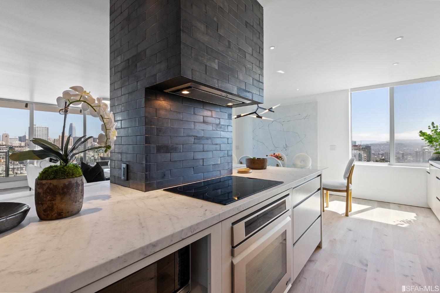 1835 Franklin Street, Unit 1601 San Francisco, CA 94109 - Photo 6 of 37 a kitchen with a sink and a stove top oven