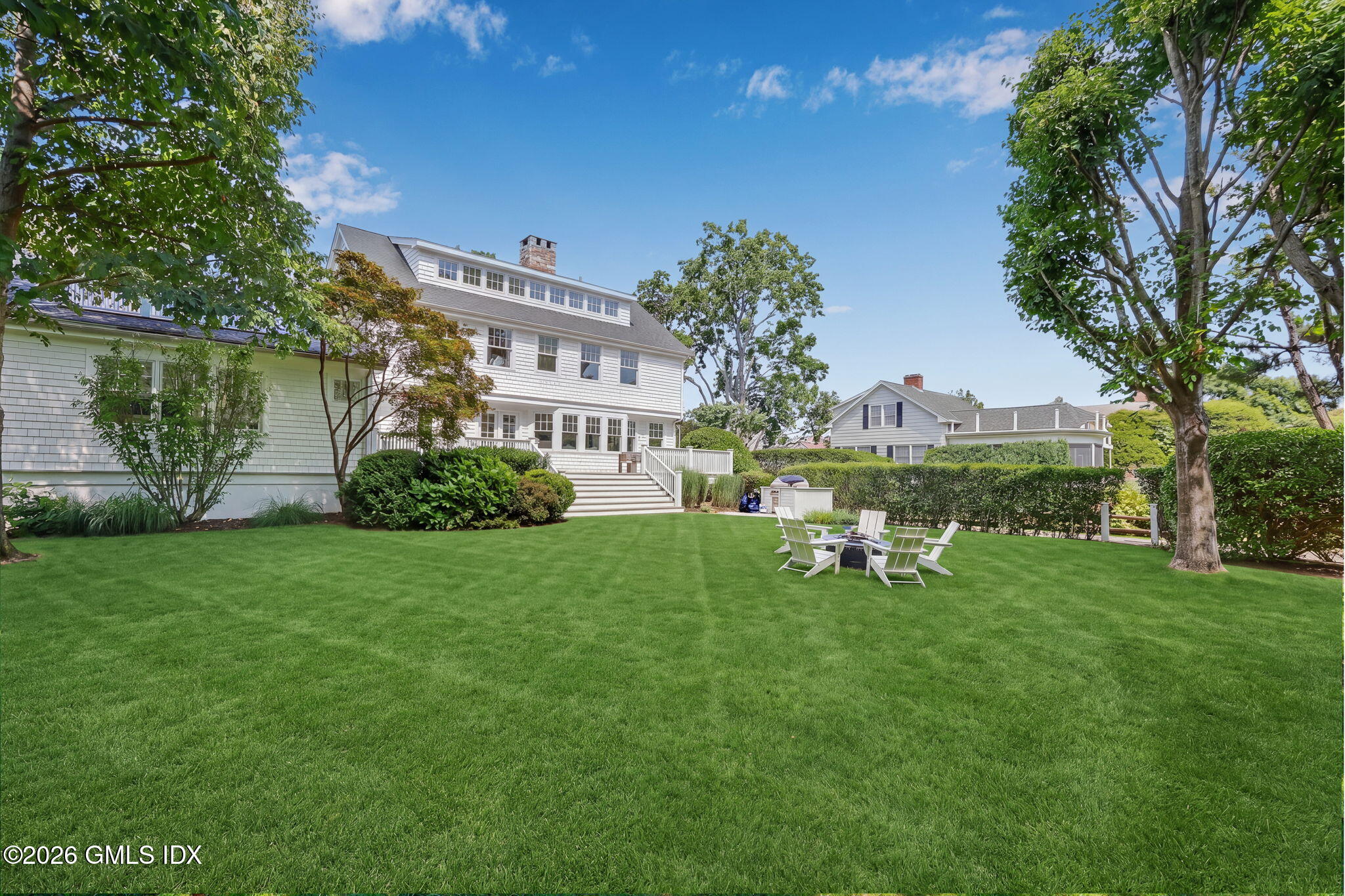 24 Rocky Point Road Old Greenwich, CT 06870 - Photo 31 of 39 Expansive Level Backyard