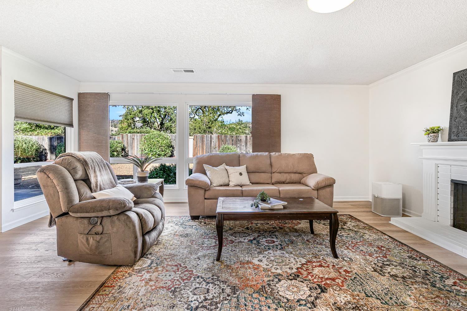 199 White Oak Drive Santa Rosa, CA 95409 - Photo 15 of 37 a living room with furniture and a large window
