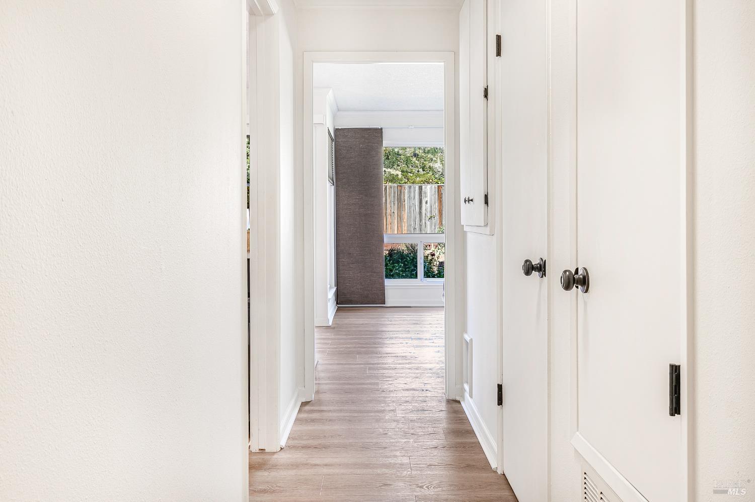199 White Oak Drive Santa Rosa, CA 95409 - Photo 21 of 37 a view of a hallway with wooden floor