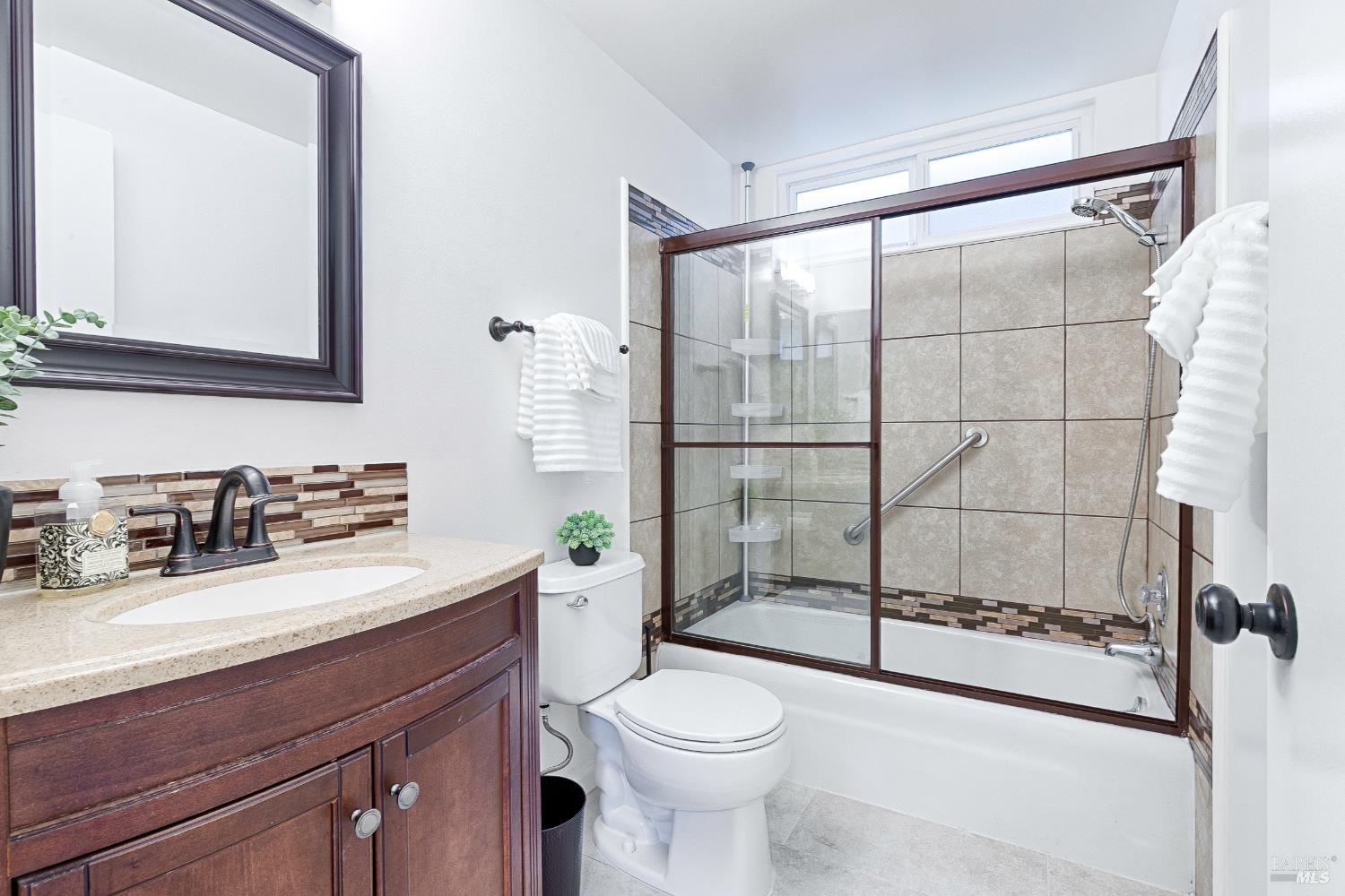 199 White Oak Drive Santa Rosa, CA 95409 - Photo 24 of 37 a bathroom with a sink toilet and shower
