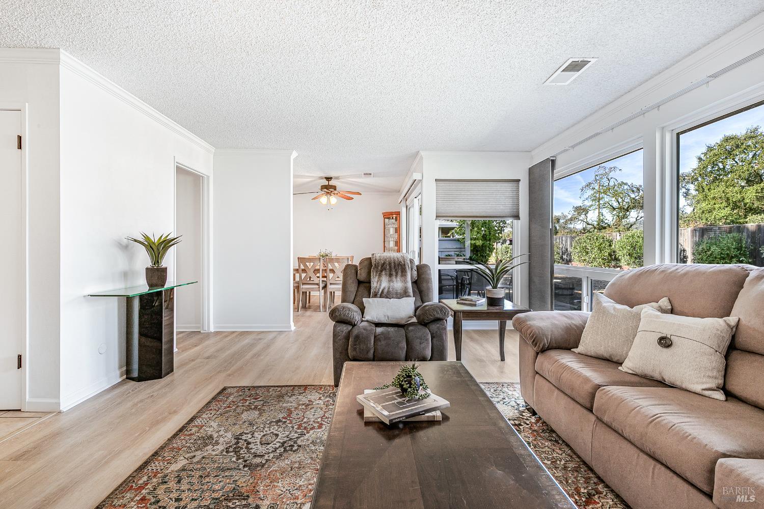 199 White Oak Drive Santa Rosa, CA 95409 - Photo 4 of 37 a living room with furniture and a table