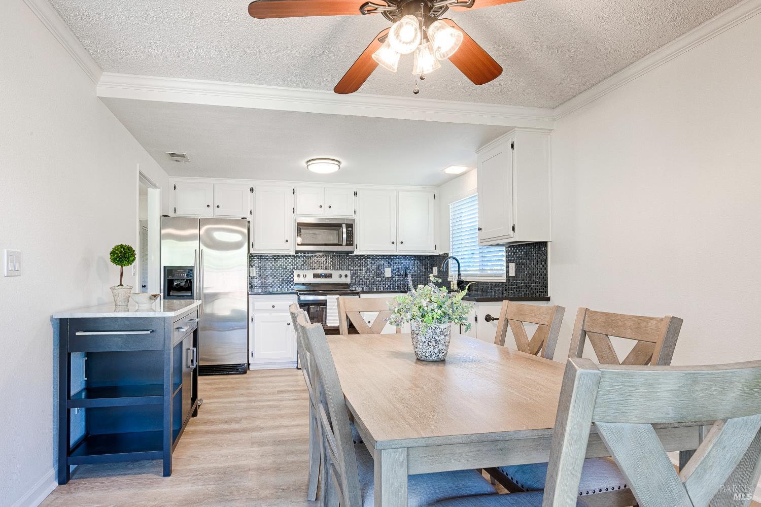 199 White Oak Drive Santa Rosa, CA 95409 - Photo 8 of 37 a view of kitchen with cabinets and wooden floor