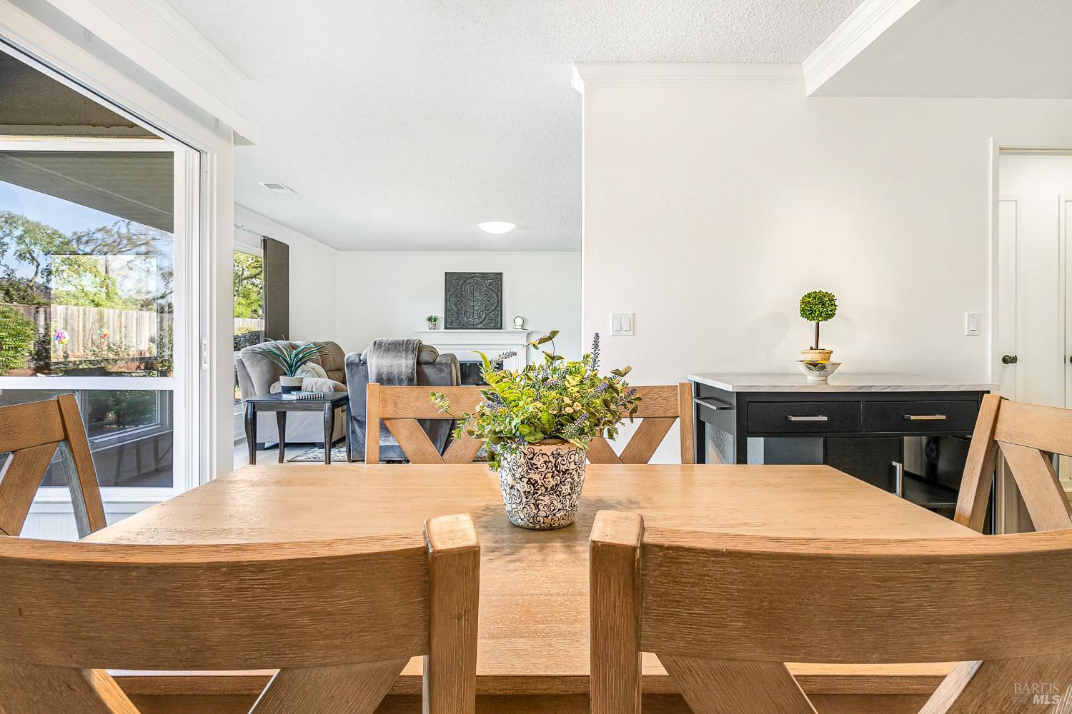 199 White Oak Drive Santa Rosa, CA 95409 - Photo 9 of 37 a dining room with furniture and a potted plant