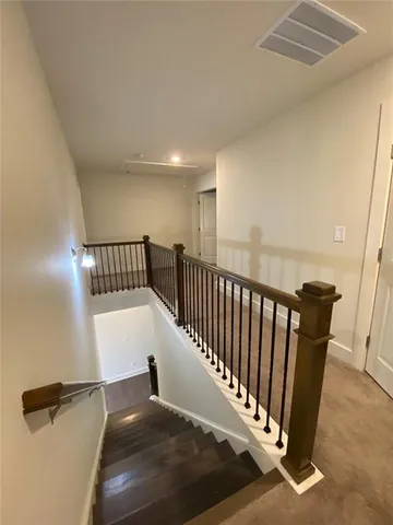 a view of entryway with wooden floor