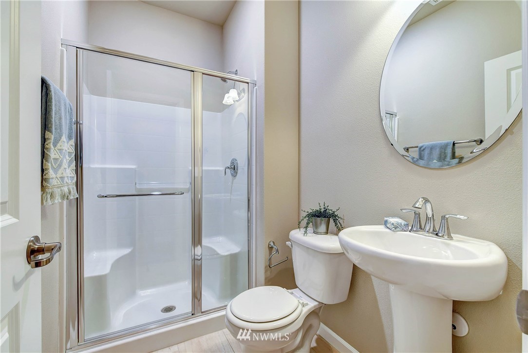 21323 42nd Avenue Southeast Bothell, WA 98021 - Photo 8 of 16 a bathroom with a sink toilet and shower