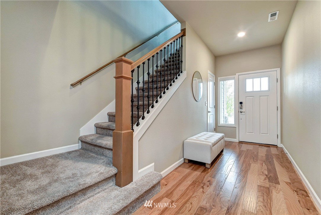 21323 42nd Avenue Southeast Bothell, WA 98021 - Photo 9 of 16 a view of entryway and hall with wooden floor
