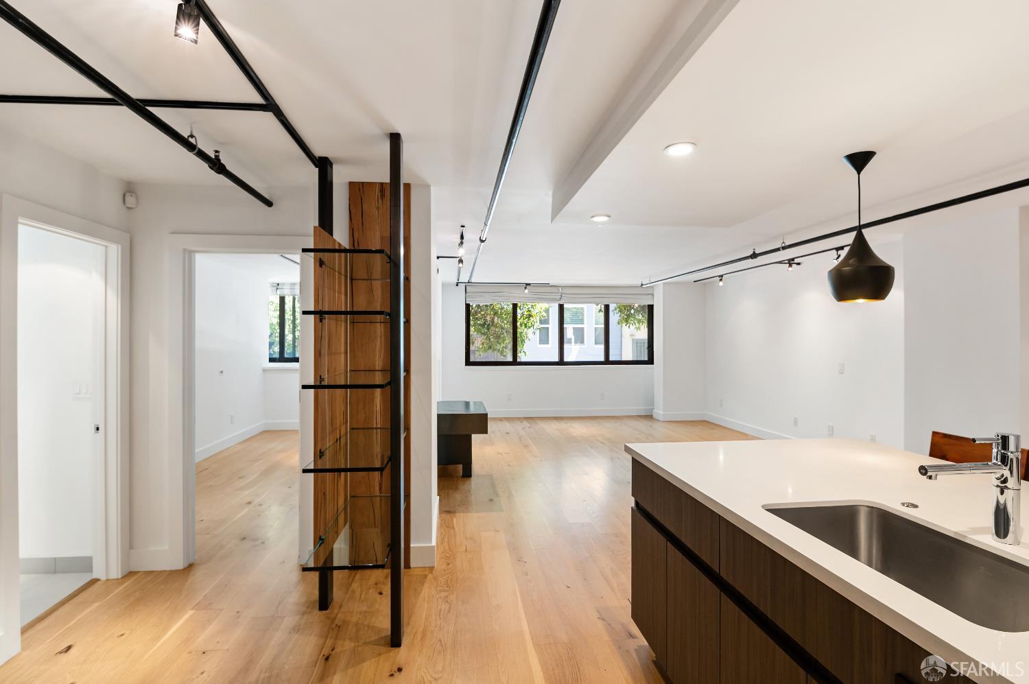 1875 Mission Street, Unit 109 San Francisco, CA 94103 - Photo 11 of 29 a view of a kitchen cabinets a sink and dishwasher