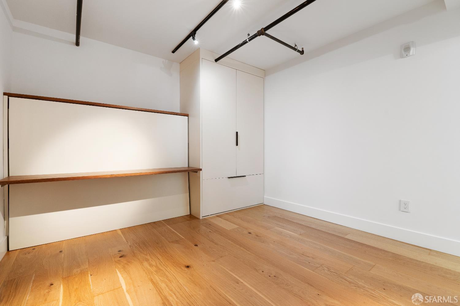 1875 Mission Street, Unit 109 San Francisco, CA 94103 - Photo 17 of 29 a view of an empty room