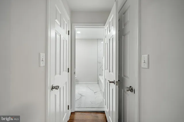 a bathroom with a sink a mirror and a vanity
