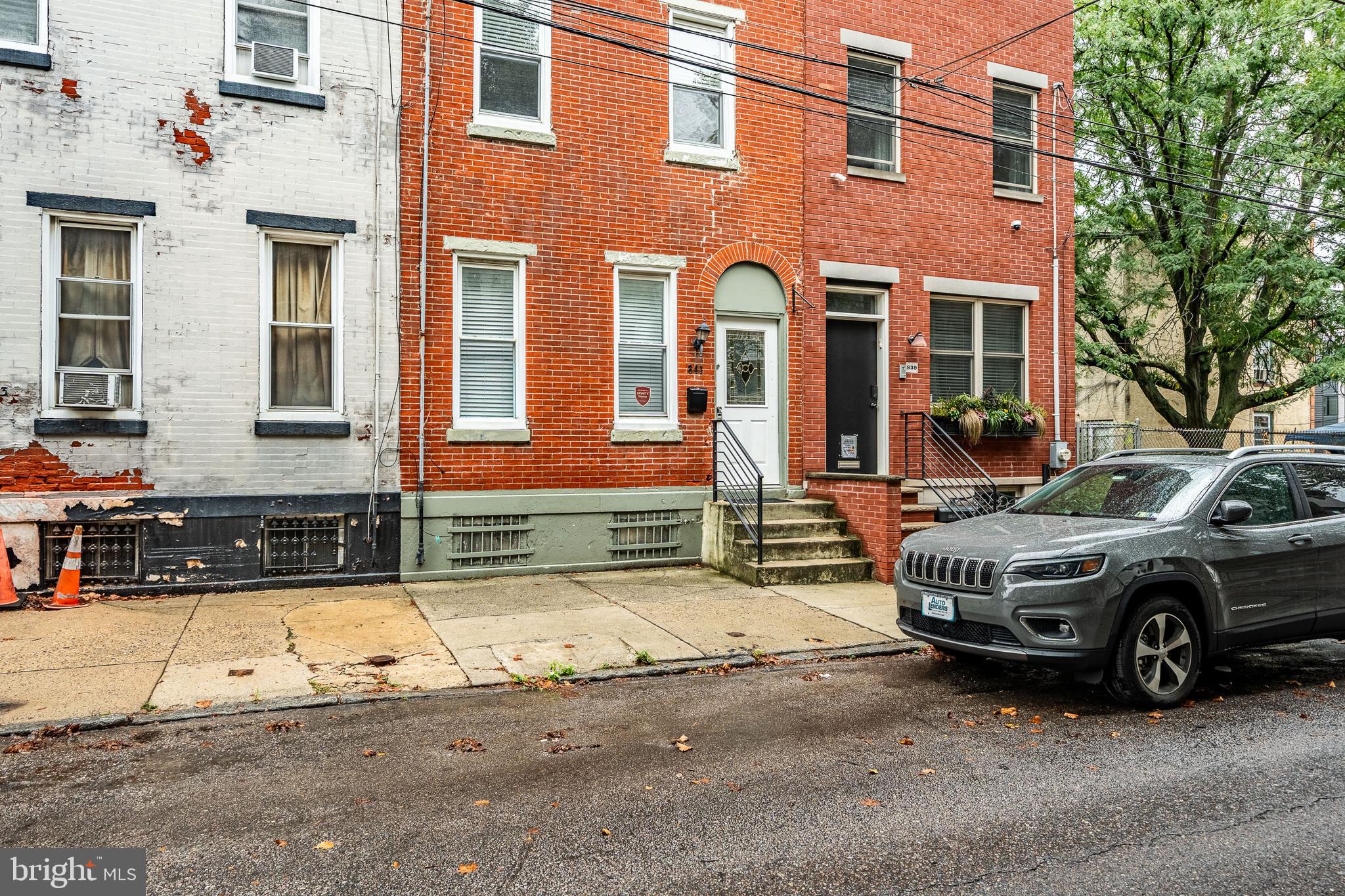 841 Perkiomen Street Philadelphia, PA 19130 - Photo 2 of 23 a view of a car parked in front of a building