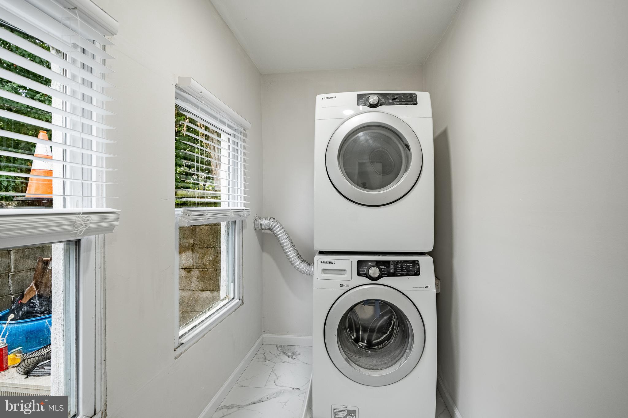 841 Perkiomen Street Philadelphia, PA 19130 - Photo 9 of 23 a utility room with dryer and washer