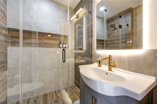 a view of outdoor space with wooden floor