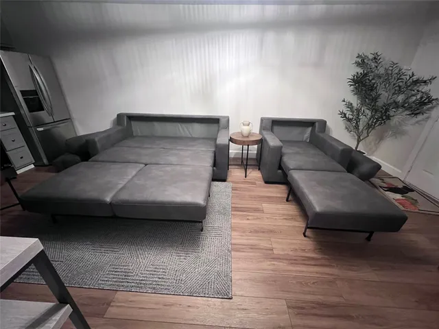 a living room with furniture and a couch