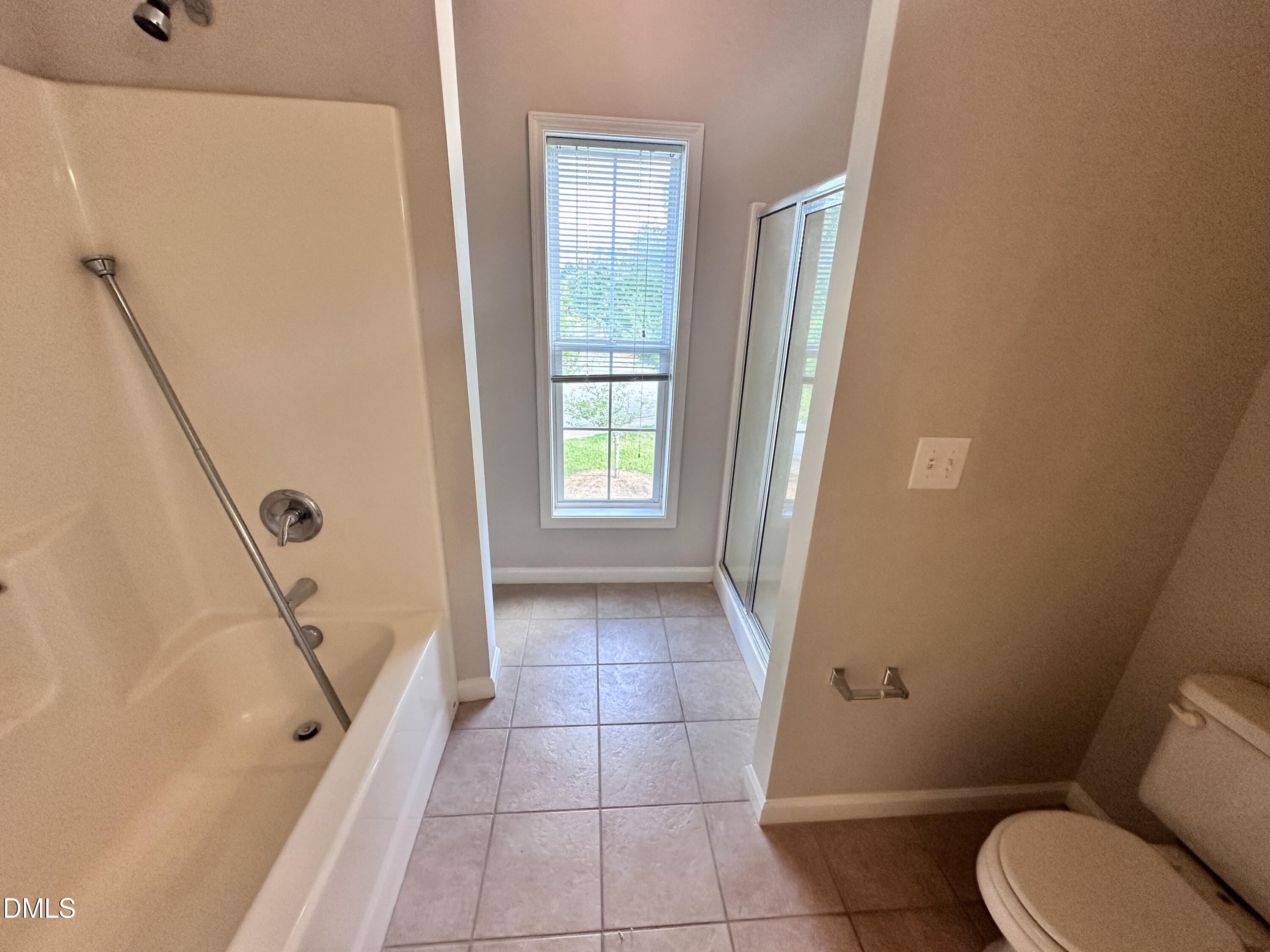 2511 Huntscroft Lane, Unit 203 Raleigh, NC 27617 - Photo 12 of 13 a bathroom with sink toilet and shower