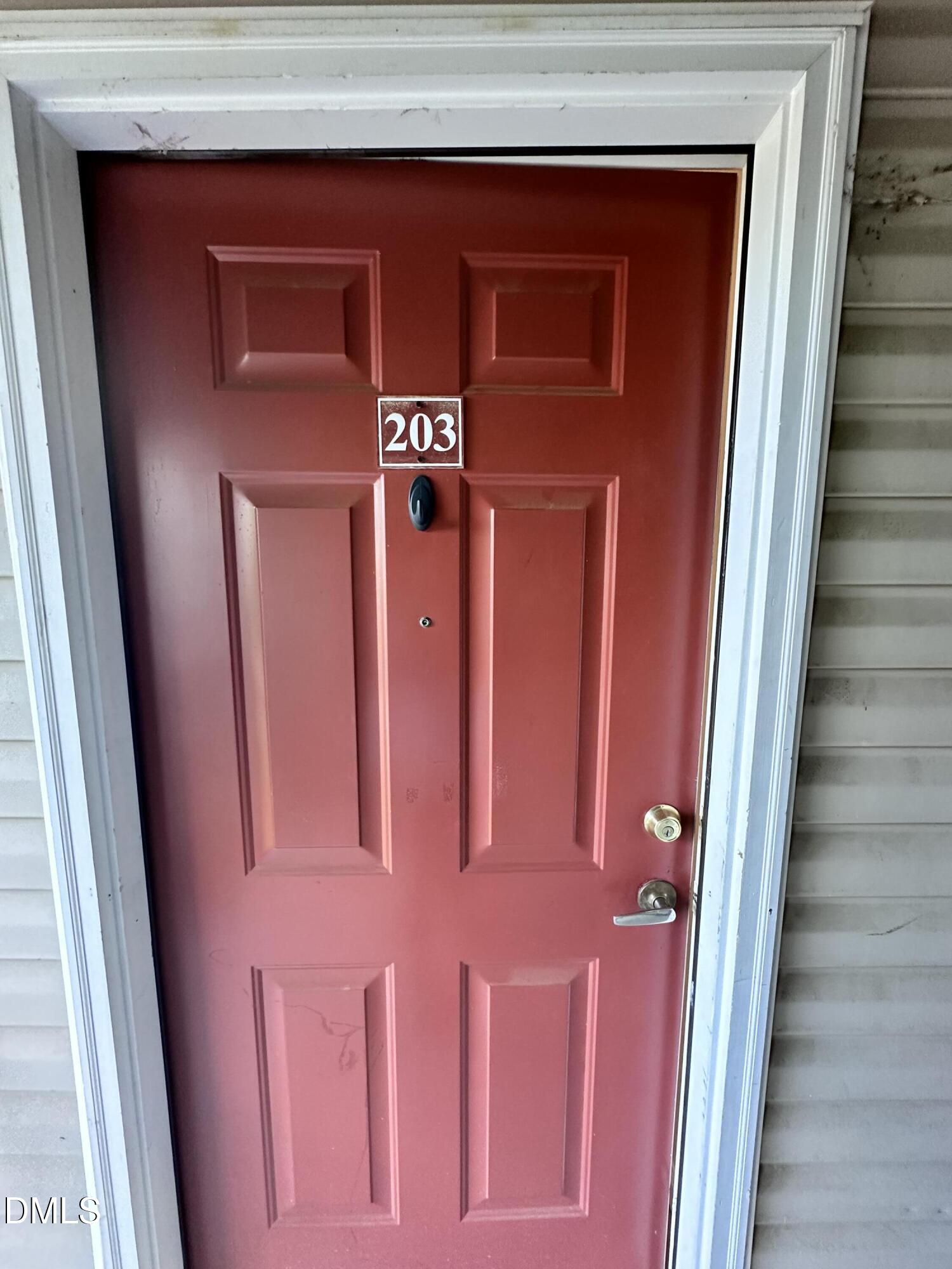 2511 Huntscroft Lane, Unit 203 Raleigh, NC 27617 - Photo 2 of 13 a view of front door