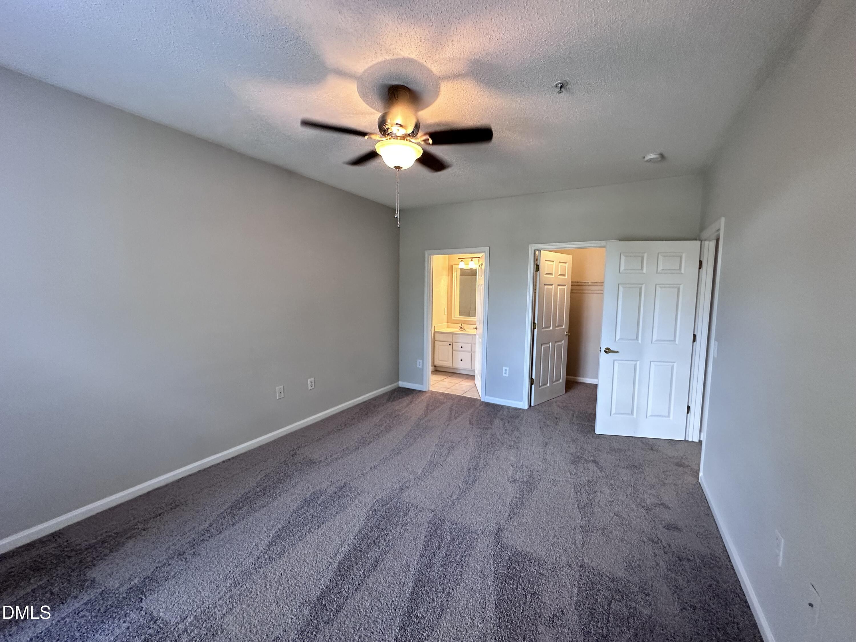 2511 Huntscroft Lane, Unit 203 Raleigh, NC 27617 - Photo 10 of 13 a view of an empty room with a window