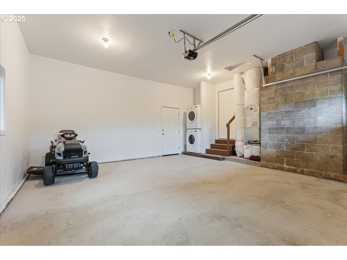 32900 Southeast Colorado Road Sandy, OR 97055 - Photo 14 of 38 a room with gym equipment and a view of living room