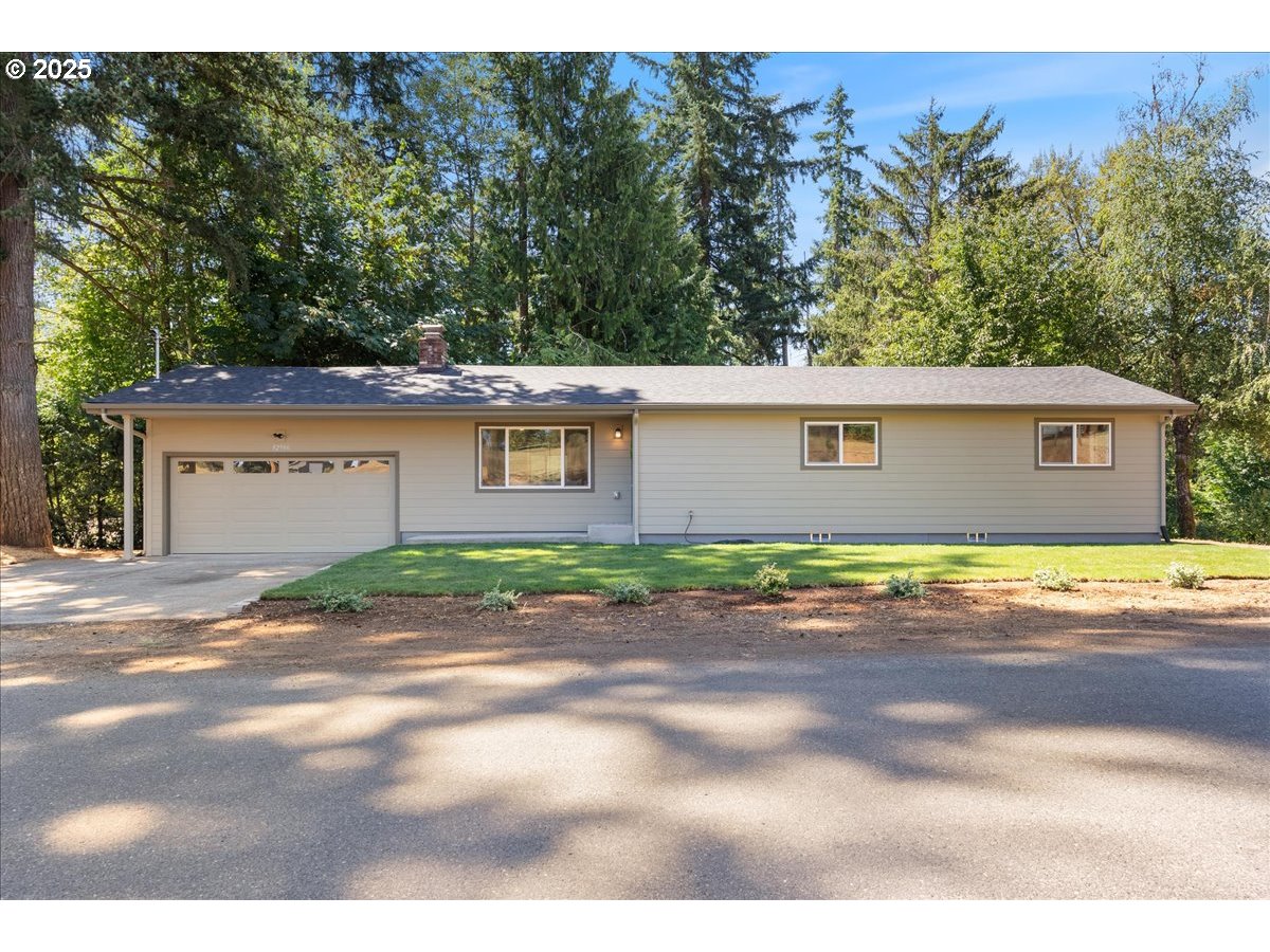32900 Southeast Colorado Road Sandy, OR 97055 - Photo 2 of 38 a view of a house with a backyard