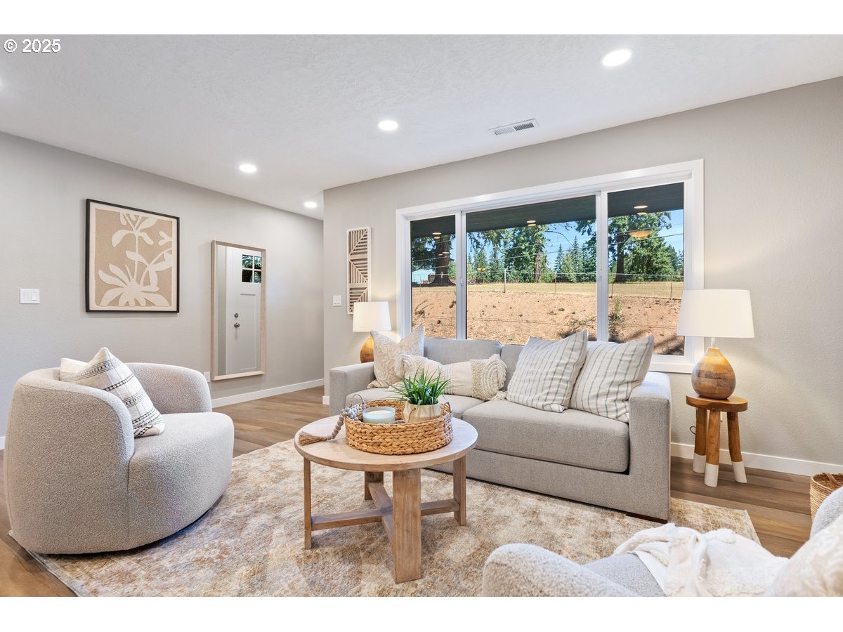 32900 Southeast Colorado Road Sandy, OR 97055 - Photo 7 of 38 a living room with furniture and a large window
