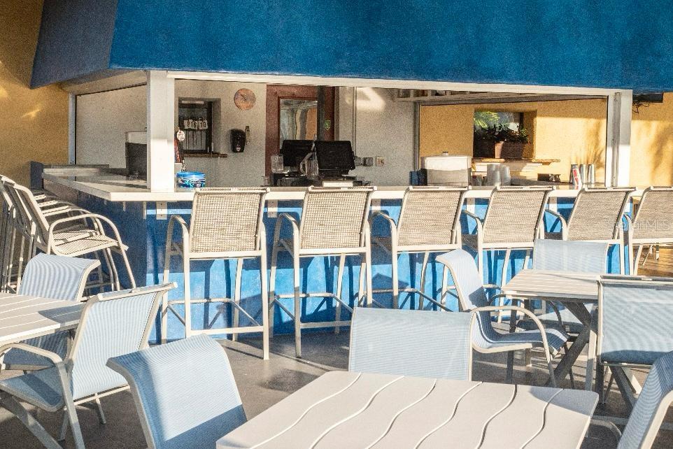 8979 California Palm Road Kissimmee, FL 34747 - Photo 18 of 33 a view of a dining room with furniture window and outside view