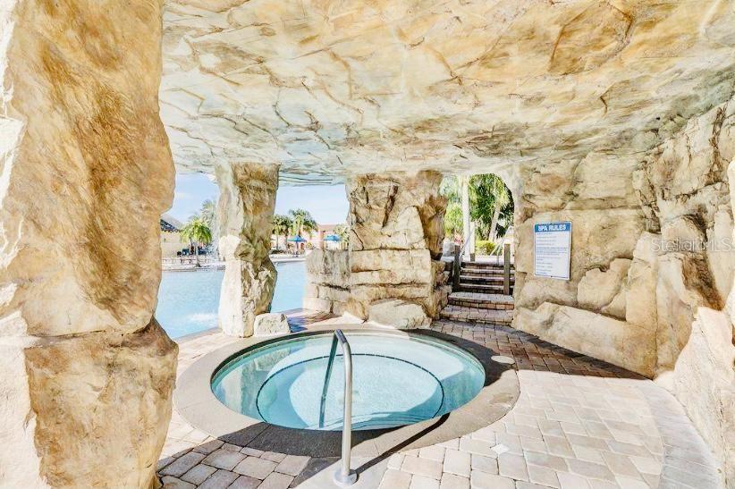 8979 California Palm Road Kissimmee, FL 34747 - Photo 27 of 33 a living room with couch and outdoor seating