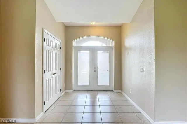 a view of a hallway with front door