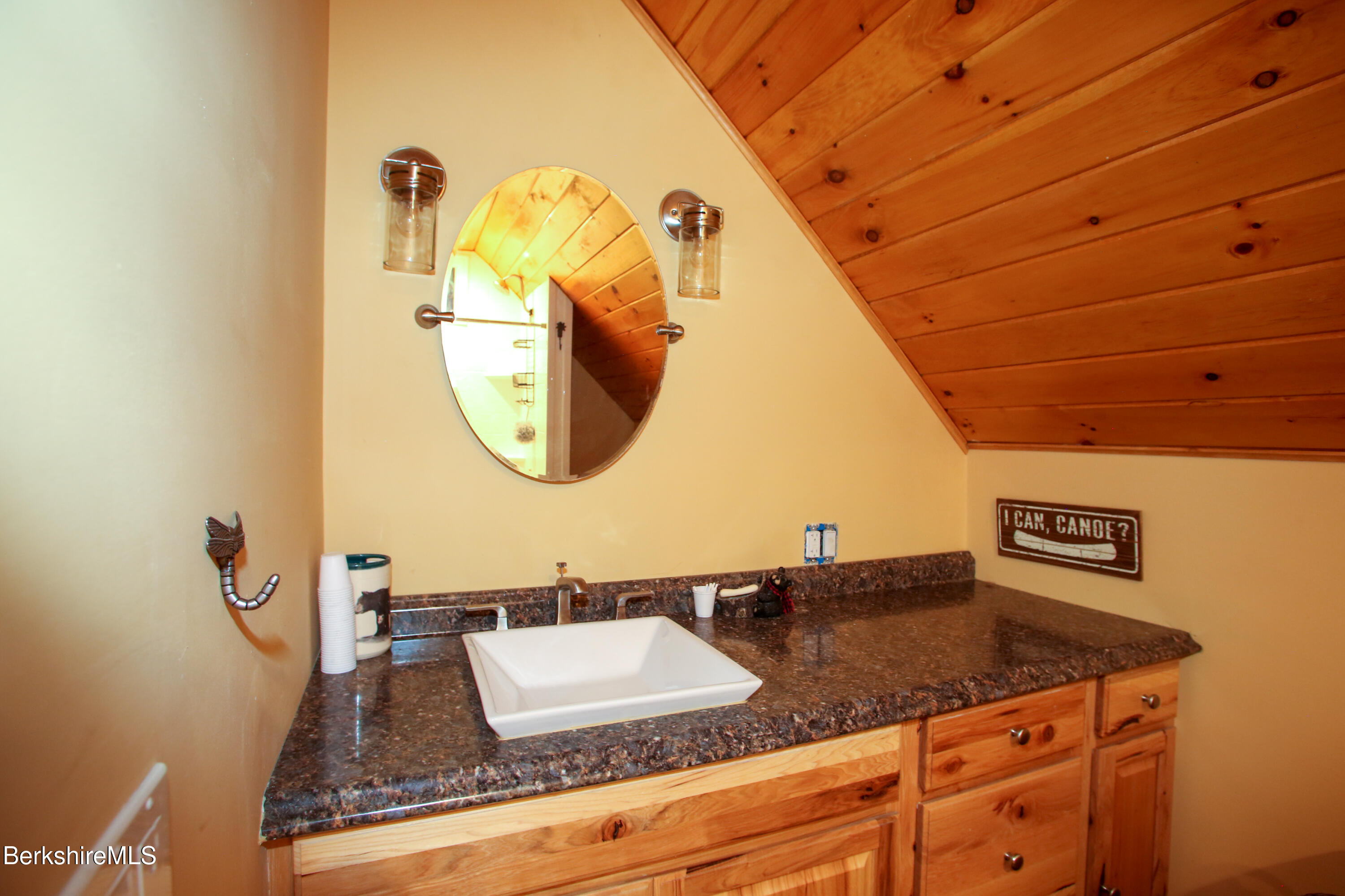 201 Ford Hill Road Rowe, MA 01367 - Photo 17 of 34 a bathroom with a granite countertop sink and a mirror