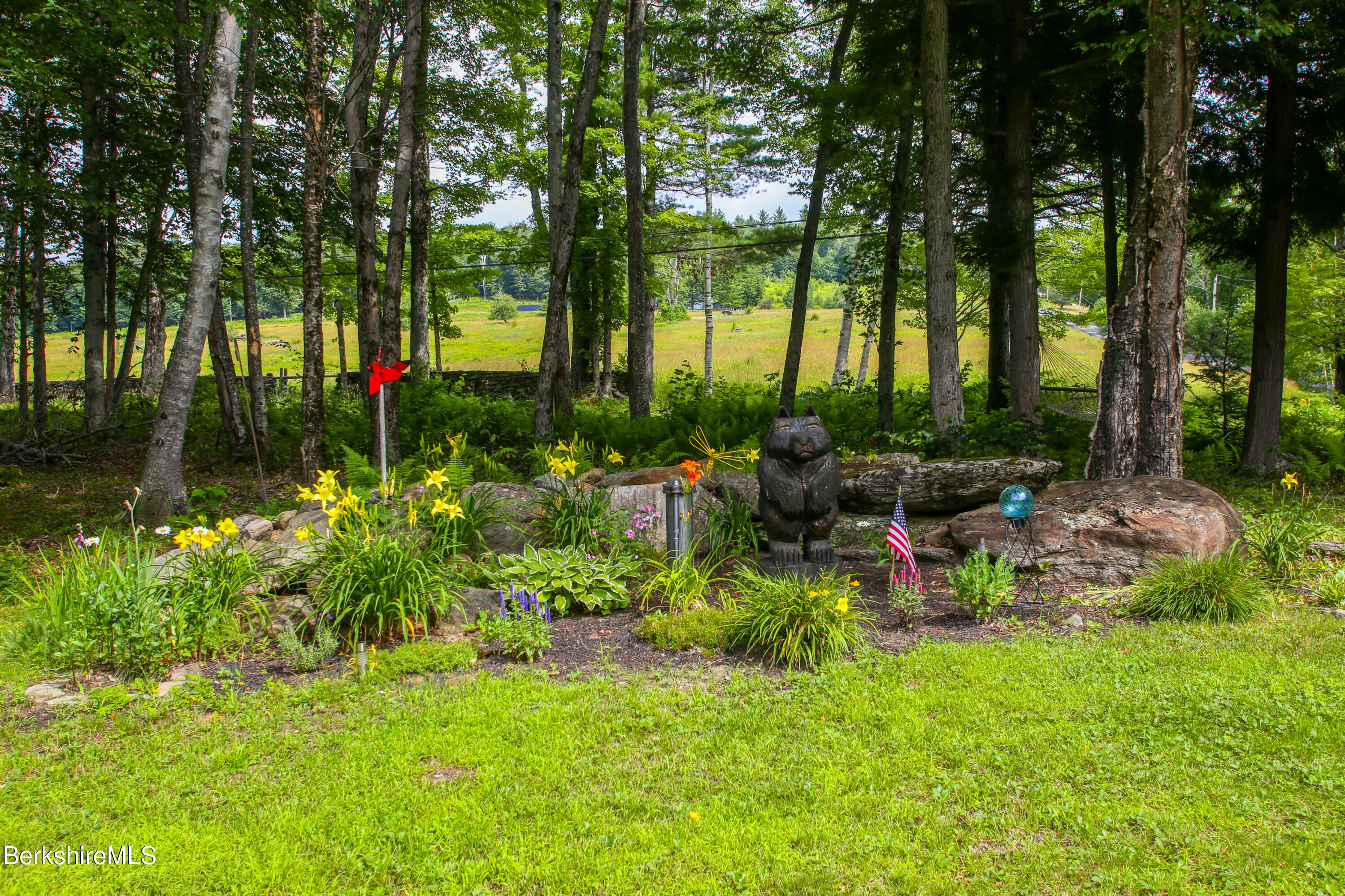 201 Ford Hill Road Rowe, MA 01367 - Photo 26 of 34 a view of a bench in a garden