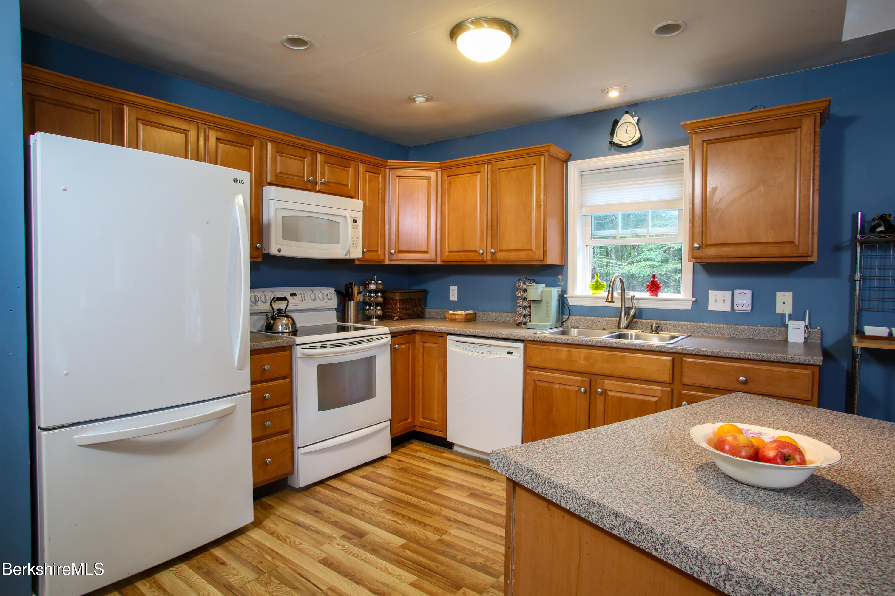 201 Ford Hill Road Rowe, MA 01367 - Photo 6 of 34 a kitchen with stainless steel appliances granite countertop a stove a sink and a refrigerator