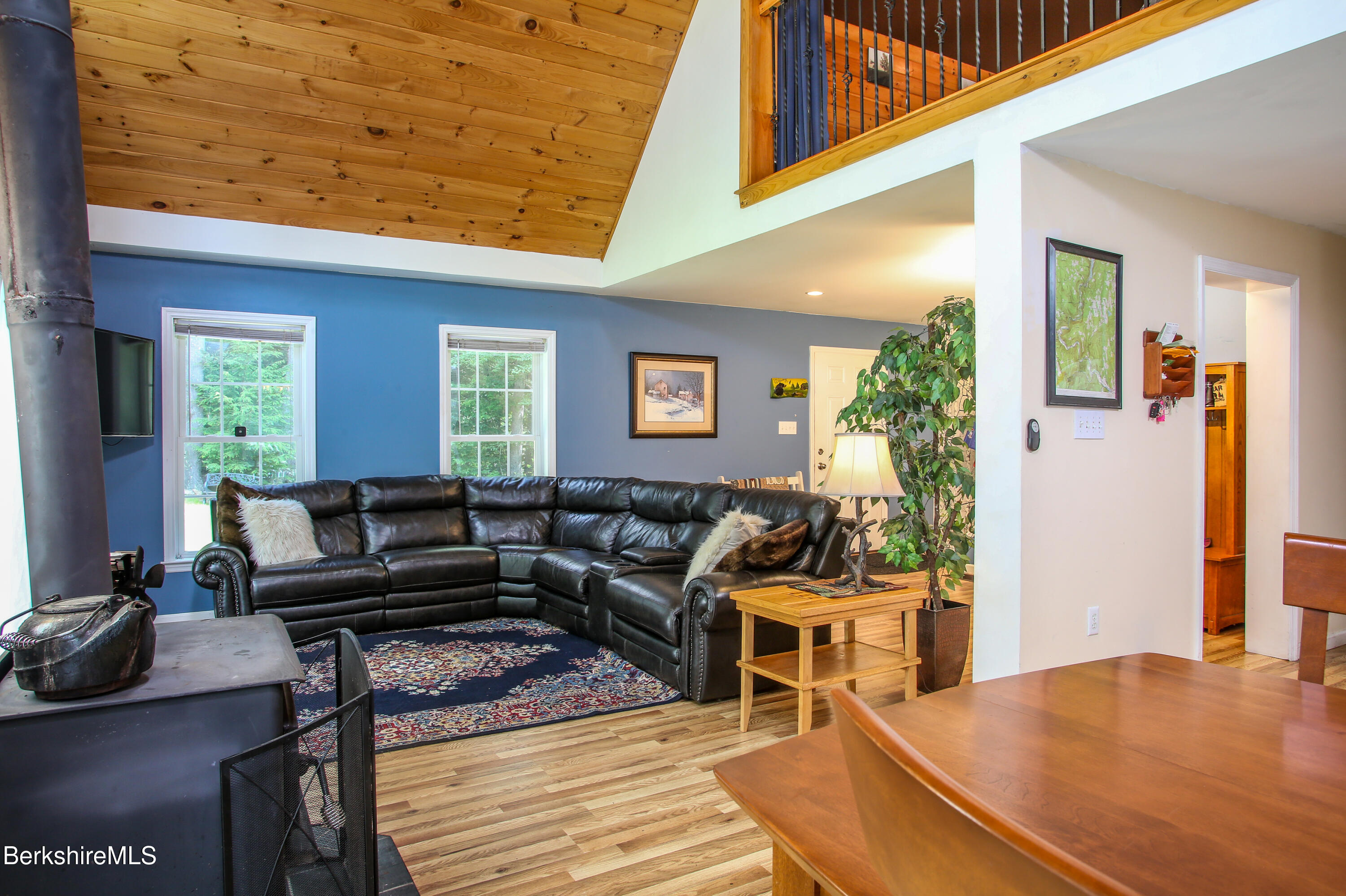 201 Ford Hill Road Rowe, MA 01367 - Photo 9 of 34 a living room with furniture and a wooden floor