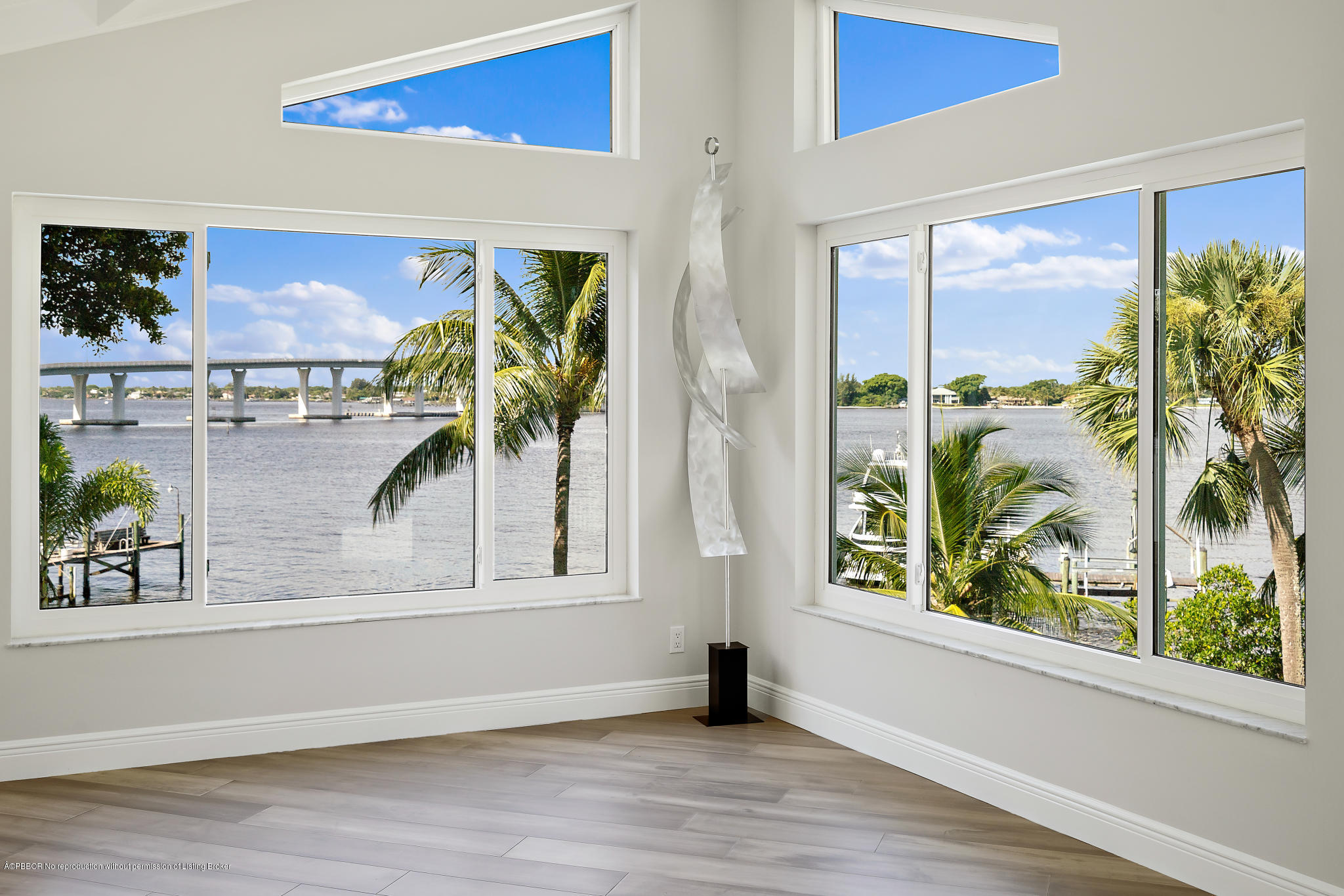 19 North River Road Sewall's Point, FL 34996 - Photo 18 of 51 a view of a living room and a window